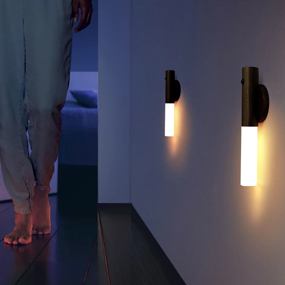 Compact motion-activated LED night light used as a desk lamp, providing soft illumination.
